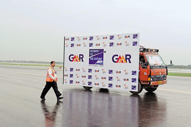 GMR Infra to transfer stake in 2 transmission projects to Adani