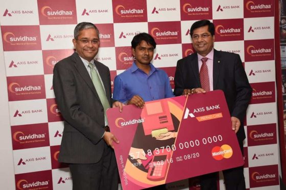 Rajiv Anand, Executive Director, Axis Bank (left); Paresh Rajde, Founder of Suvidha infoserve (Right) with the recipient Sanjay Benbansi . Axis Bank is the third largest private sector bank in India. Axis Bank offers the entire spectrum of services to customer segments covering Large and Mid-Corporates, SME, Agriculture and Retail Businesses.