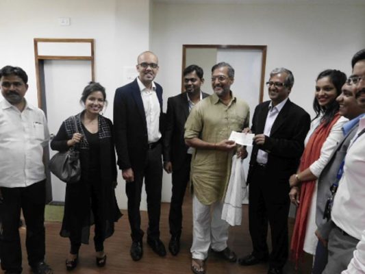 Technip team hands over cheque to Nana Patekar and Naam Foundation. naammh.org/