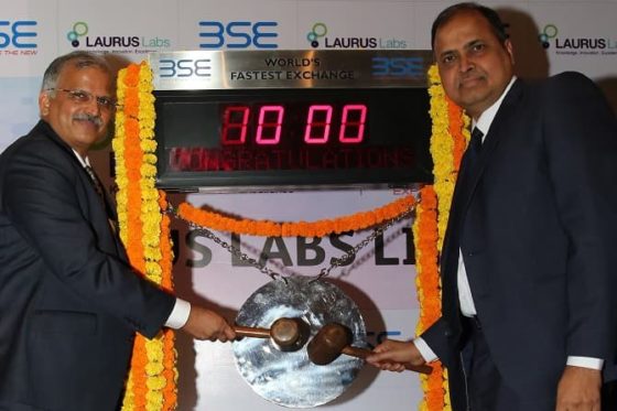 Dr. Satyanarayana Chava, Founder & CEO, Laurus Labs Ltd. and Mr. Ravikumar, ED & CFO, Laurus Labs Ltd. hitting the gong at the listing ceremony at BSE.