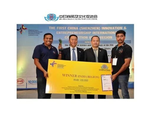 Left to Right Mr. Raj Neravati Founder and CEO of Hug Innovations Corp receiving first prize from Mr. Niu Xiping Detachment Captain, Human Resources and Social Security Administration of Shenzhen Municipality