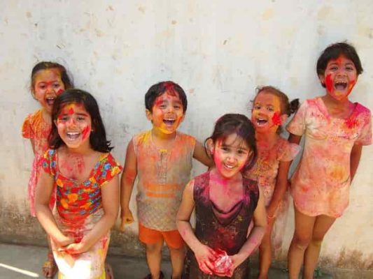 Kids playing Holi